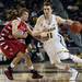 Michigan freshman Nik Stauskas dribbles past a Saginaw Valley State defender on Monday. Daniel Brenner I AnnArbor.com